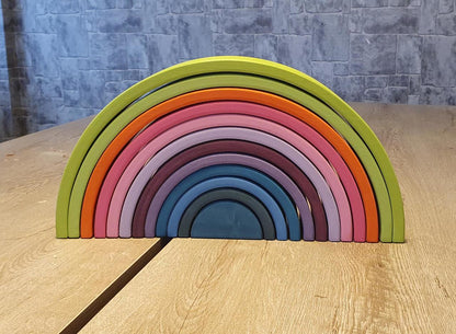 Pastel wooden rainbow arch for Waldorf education
