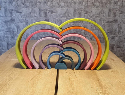 Pastel wooden rainbow arches for Waldorf education
